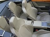 a car with four seats and a steering wheel