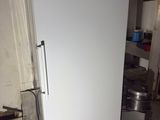 an image of a white refrigerator in a kitchen
