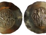 une image représentant deux pièces d'argent sur lesquelles figurent un homme et une femme