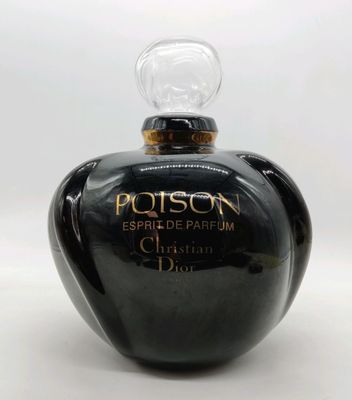 DIOR. Factice géant vide "Poison" en verre bordeaux foncé, t…