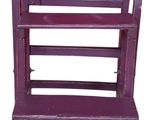 purple wooden shelf with three shelves on each side