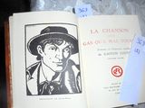 a book with a picture of a man in a hat