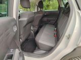 a car that has a seat in the back of it