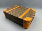 louis vuitton monogram canvas suitcase with leather trim