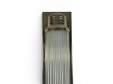 a close up of a wall light on a white background