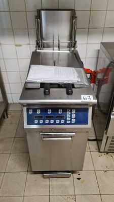 an image of a commercial kitchen with stainless steel appliances