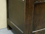a wooden chest with a wooden top on the floor