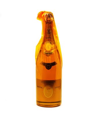 a bottle of wine that is sitting on a table