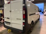 a white van that is parked in a garage