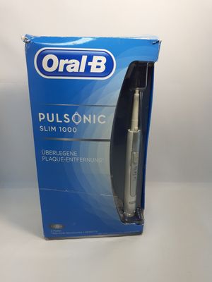 Brosse à dents électrique Oral-B Dual Sonic dans son emballage