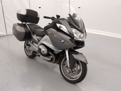 a motorcycle that is parked inside of a building