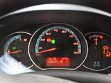 a close up of a car dashboard with a speedometer