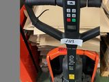 an image of a forklift in a warehouse