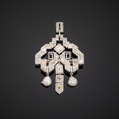 Broche pendentif en platine 850°°° (tête de chien) sertie de…