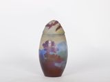 purple and blue vase on white background with birds flying in the sky
