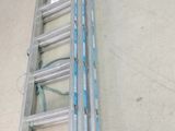 a ladder that is attached to the wall of a building