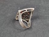 sterling silver ring with garnett garnett in the center