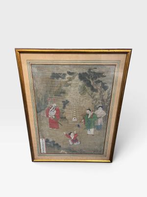 une ancienne peinture chinoise représentant une femme et deux enfants dans un jardin