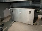 a metal box sitting on top of a metal table