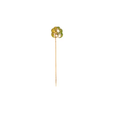 broche en forme de fleur jaune et verte sur fond blanc