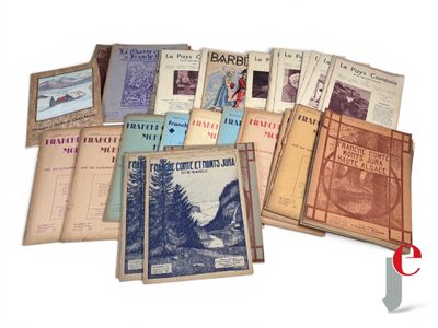 a lot of books that are sitting on a table