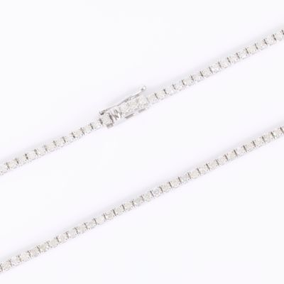 a close up of a silver chain on a white background