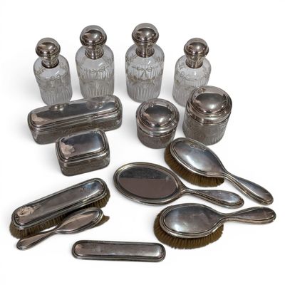 a lot of silver objects that are on the table