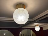 a light that is hanging from the ceiling in a room