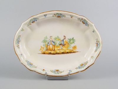 a plate with a picture of a man and a woman on it