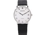 an image of a black and white watch with roman numerals