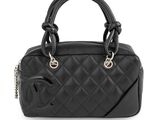un sac à main Chanel en cuir matelassé noir avec des anses en chaîne