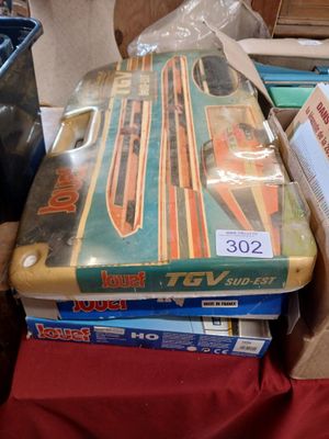 a stack of books sitting on top of a table
