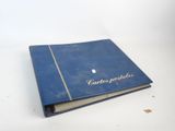 un vieux livre bleu sur lequel est écrit « Cendrillon »