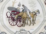 a plate with a picture of a couple riding in a horse drawn carriage