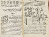un livre ouvert sur lequel figure le dessin d'un homme dans une cuisine