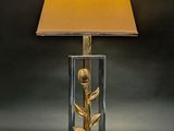 a lamp that is sitting on a table next to a lamp