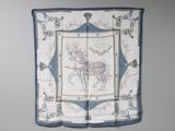 a blue and white scarf with a picture of a horse drawn carriage
