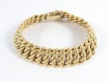 un bracelet en or jaune au motif tressé