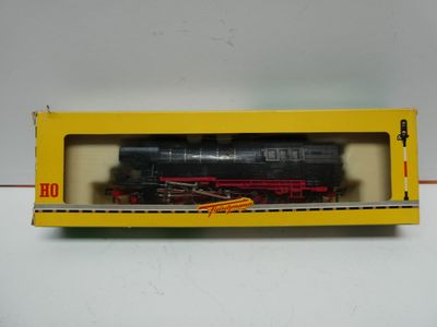an image of a toy train in a box on a table