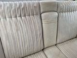 a close up of a car ' s interior with the seat up