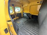 a view of the inside of a van with the door open