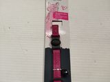 a pink dog collar with a black buckle on it