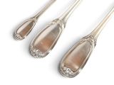 three silver spoons with handles and handles on a white surface