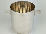 an old silver pot with a handle on a white background