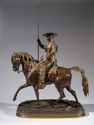 statue of a man riding a horse with a flag on it