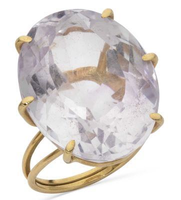 a close up of a ring with an amethorate stone on it