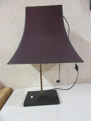 a lamp that is sitting on a white table