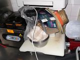 a picture of a kitchen counter with a blender and other items on it