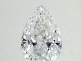 a close up of a pear shaped diamond on a white surface