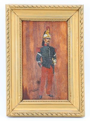 tableau représentant un soldat en uniforme, dans un cadre doré, sur fond blanc